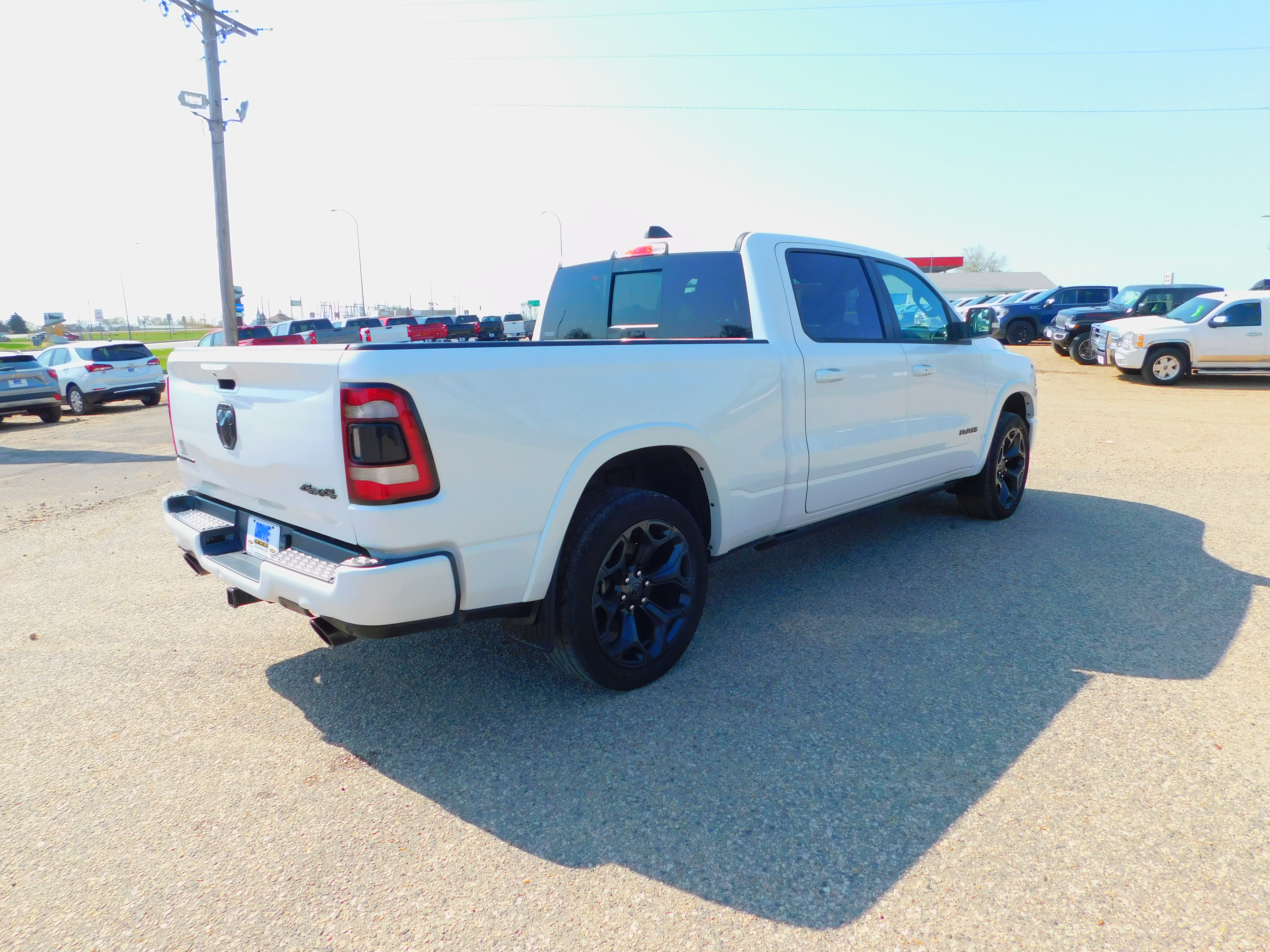 Used 2021 RAM Ram 1500 Pickup Limited with VIN 1C6SRFPT4MN812080 for sale in Rugby, ND