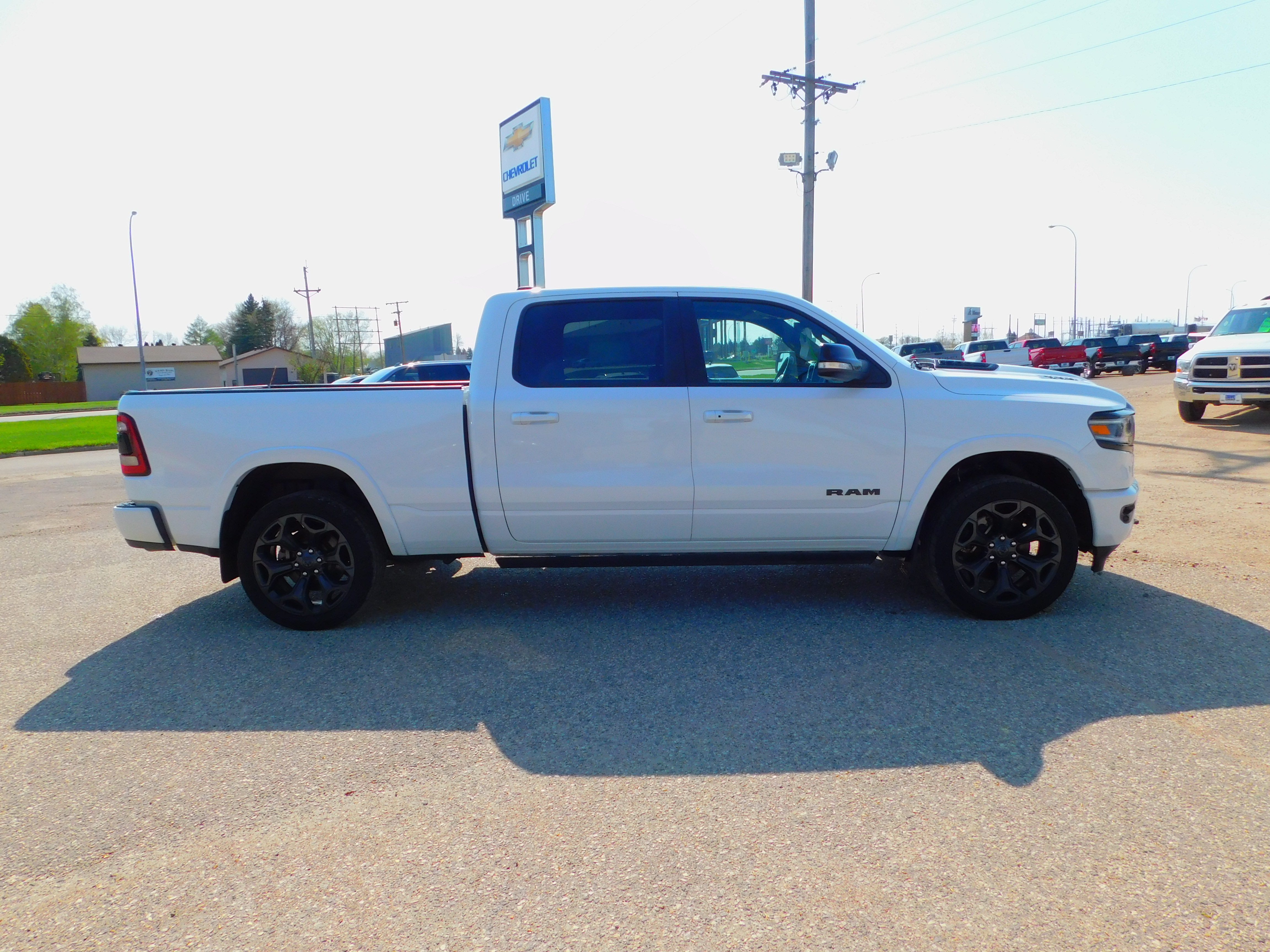 Used 2021 RAM Ram 1500 Pickup Limited with VIN 1C6SRFPT4MN812080 for sale in Rugby, ND