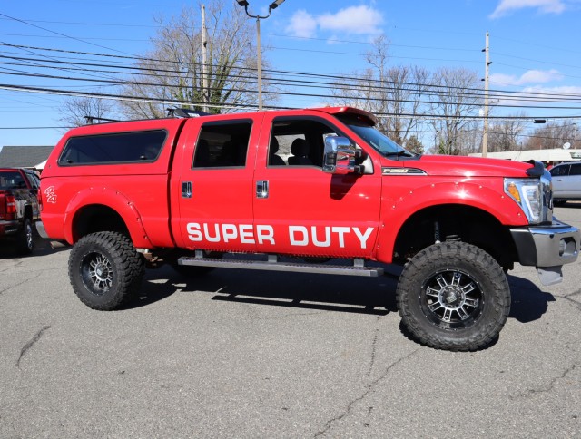 Used 2013 VERMILLION RED RED Ford XL image 4