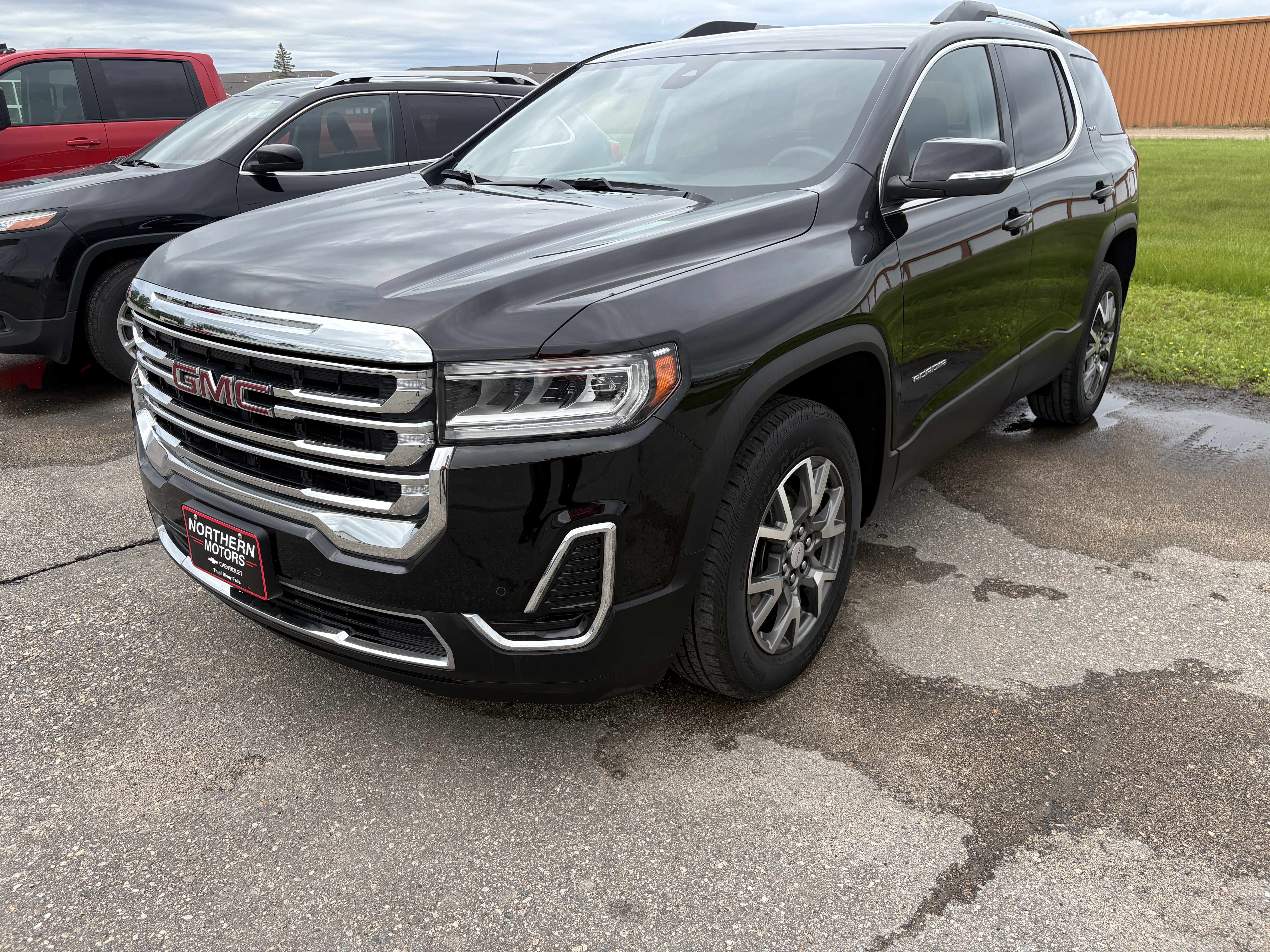 Used 2023 GMC Acadia SLE with VIN 1GKKNRL40PZ103135 for sale in Thief River Falls, Minnesota