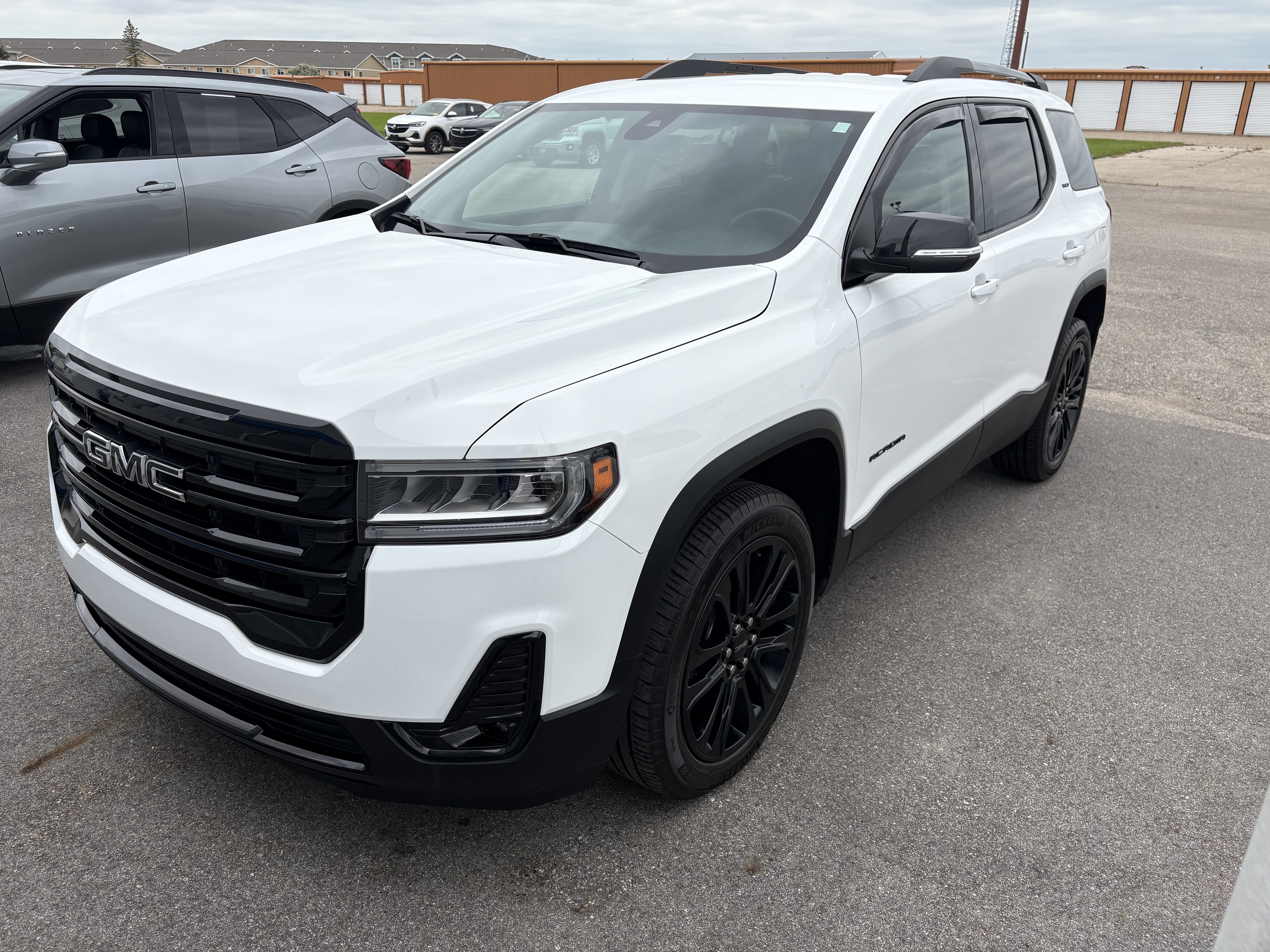 Used 2023 GMC Acadia SLT with VIN 1GKKNUL42PZ242086 for sale in Thief River Falls, Minnesota