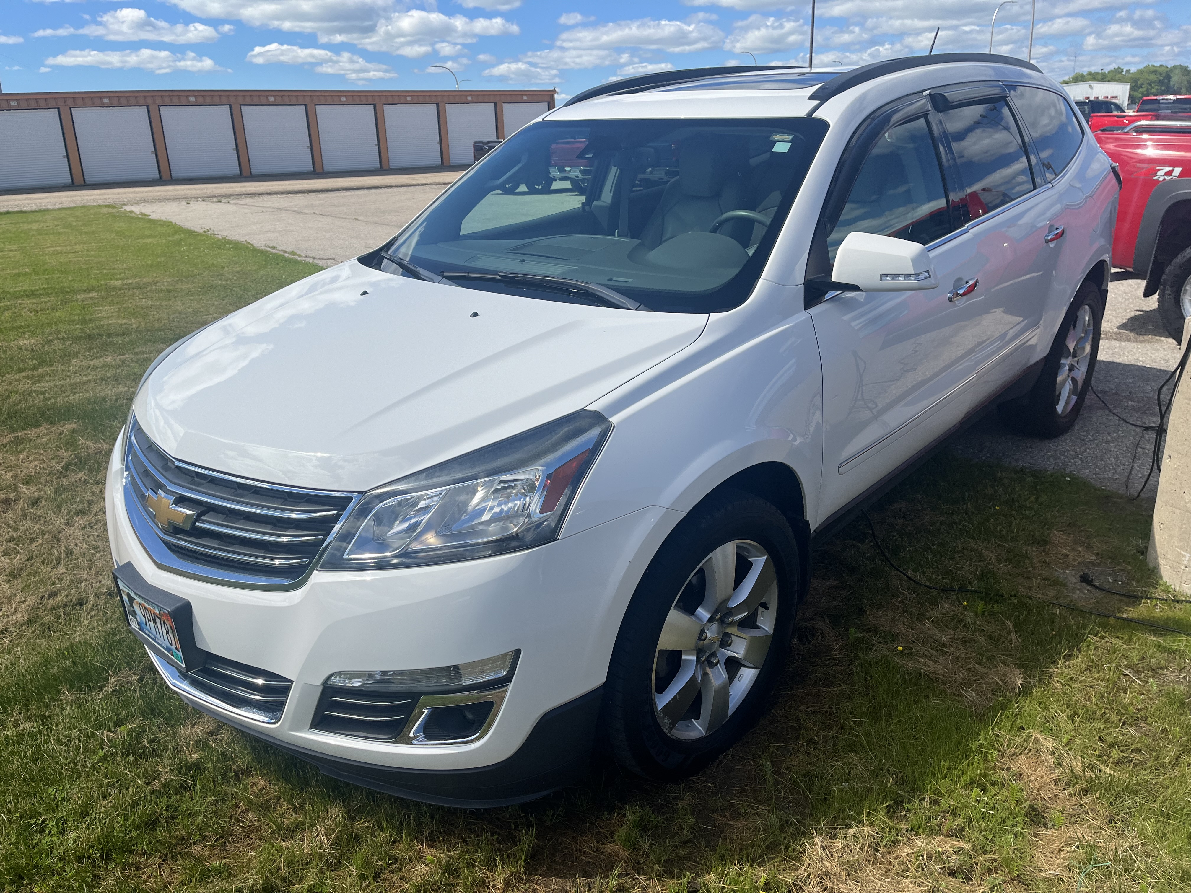 Used 2014 Chevrolet Traverse LTZ with VIN 1GNKVJKD1EJ292315 for sale in Thief River Falls, MN