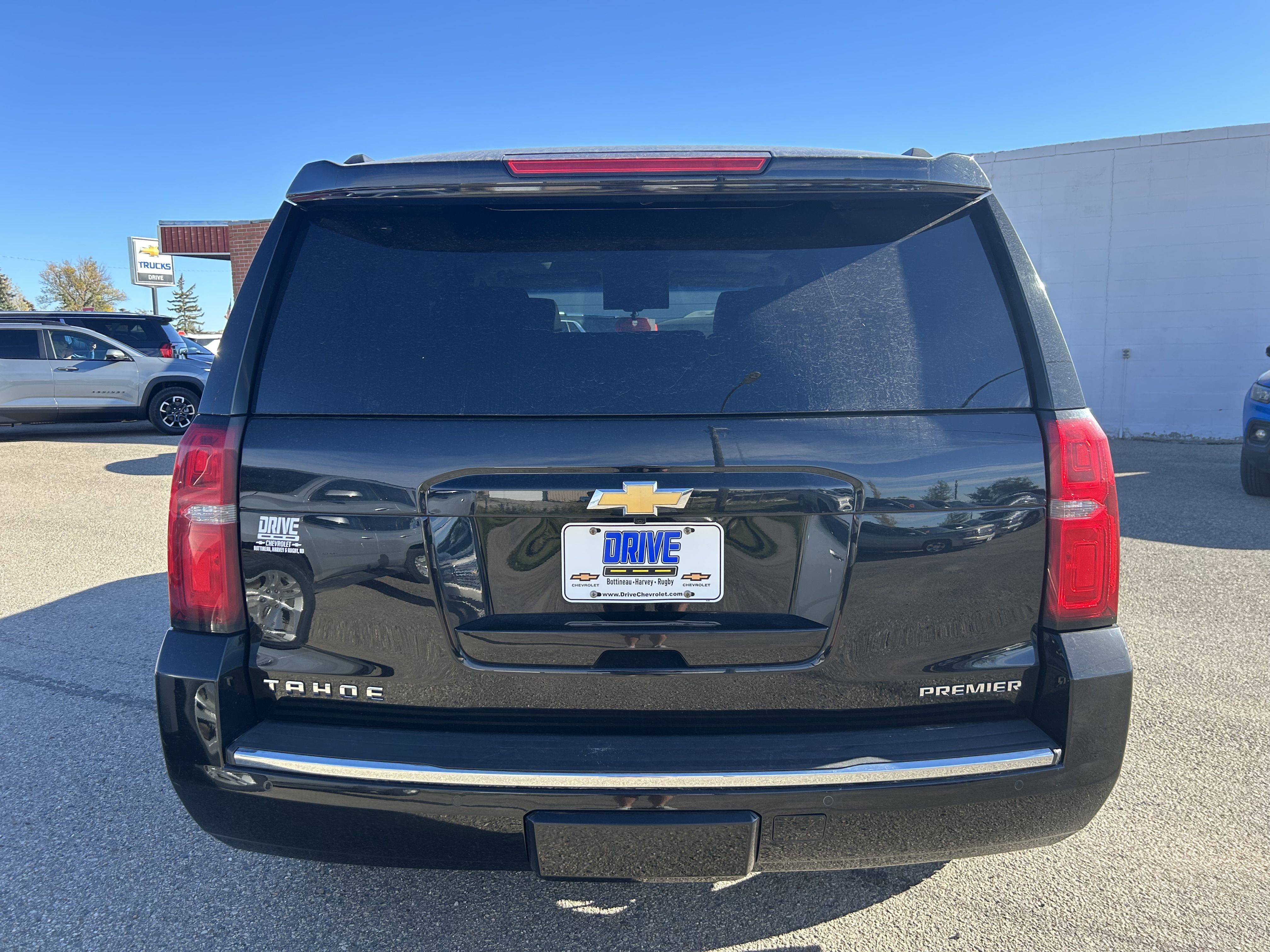 Used 2019 Chevrolet Tahoe Premier with VIN 1GNSKCKCXKR215659 for sale in Bottineau, ND