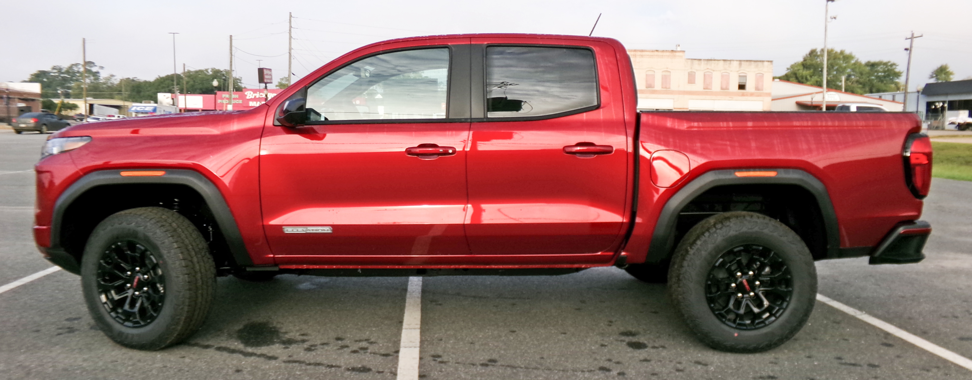 New 2026 Volcanic Red Tintcoat GMC Elevation image 2