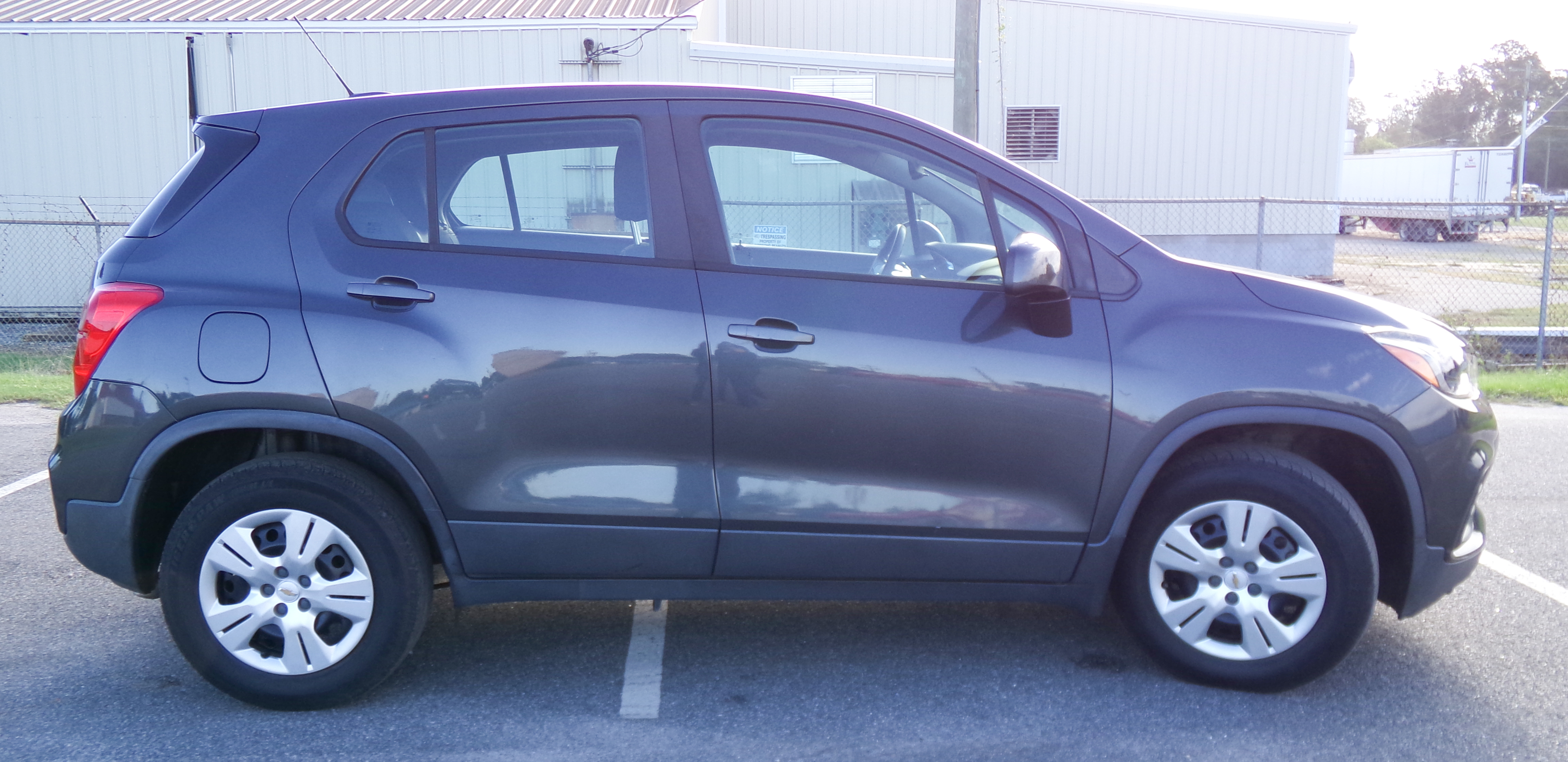 Used 2019 NIGHTFALL GRAY METALLIC Chevrolet LS image 4