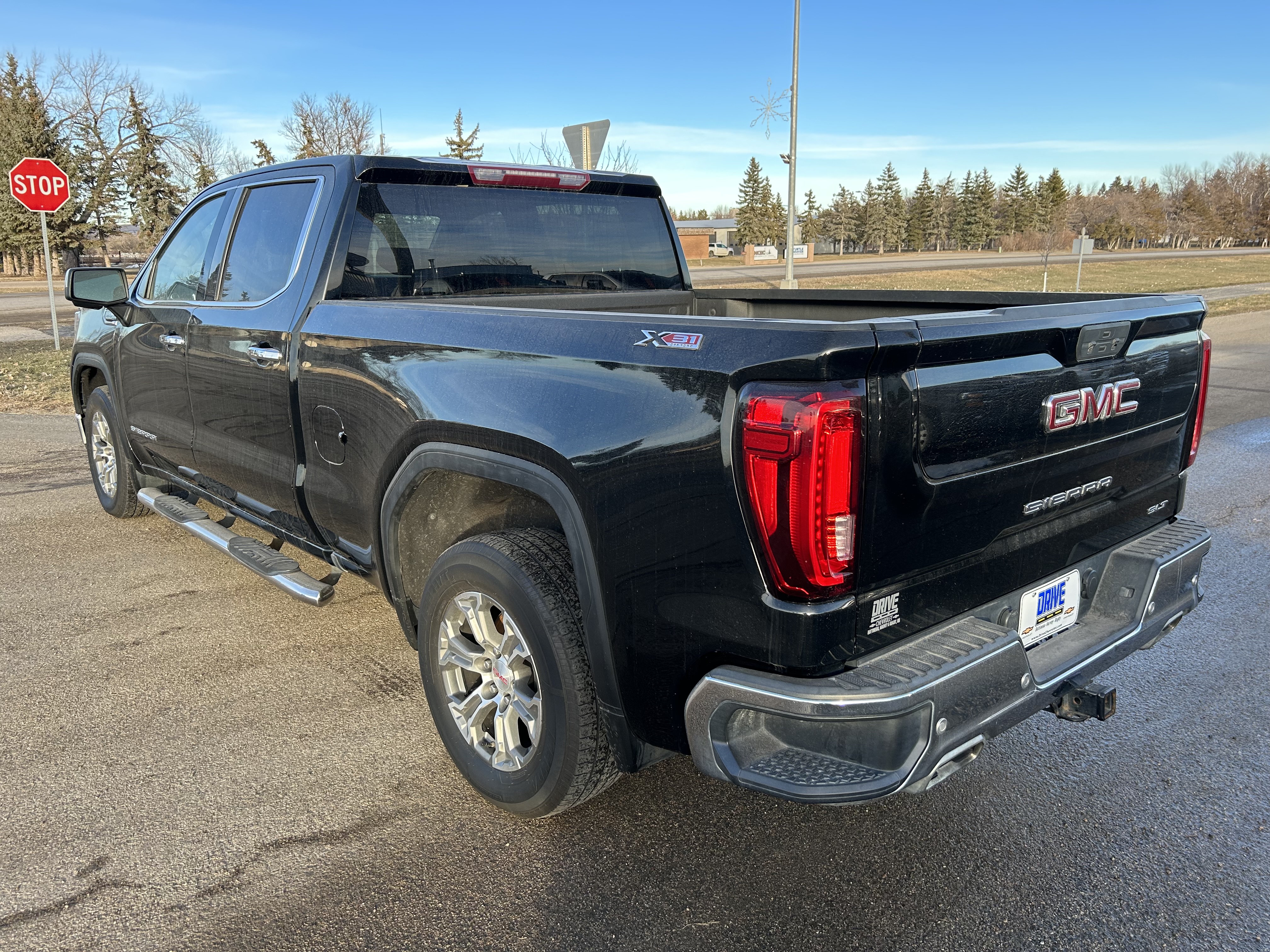 Used 2019 GMC Sierra 1500 SLT with VIN 3GTU9DED9KG205454 for sale in Bottineau, ND